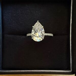 Radiant Silver Pear Shaped Ring-Open to offers